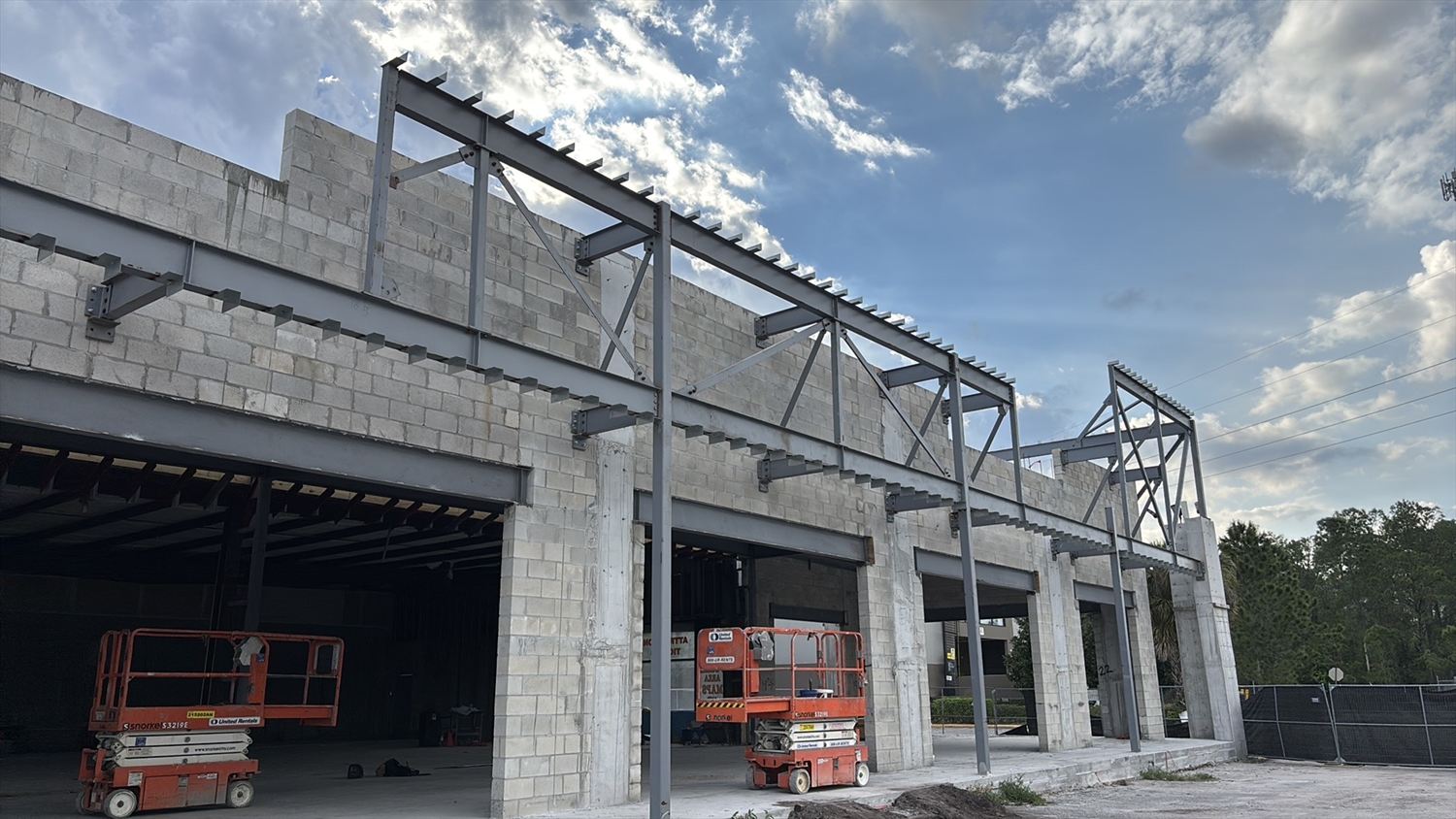 Steel canopy framing and joist seats on CMU bearing walls at Polynesian Plaza, Kissimmee